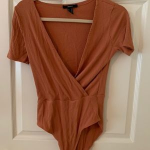 dark orange plunging v neck bodysuit